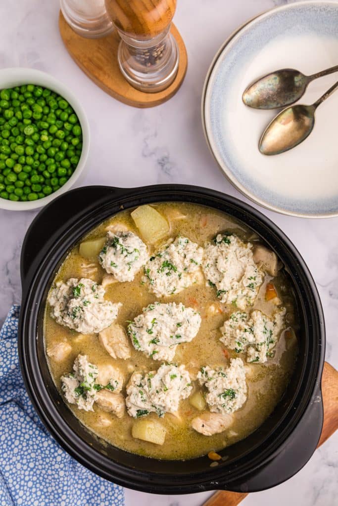 dumplings dropped into a dutch oven.