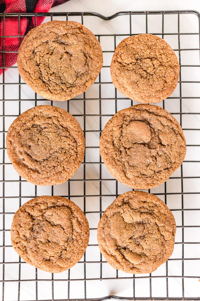 overhead shot of molasses cookies on a cooling rack