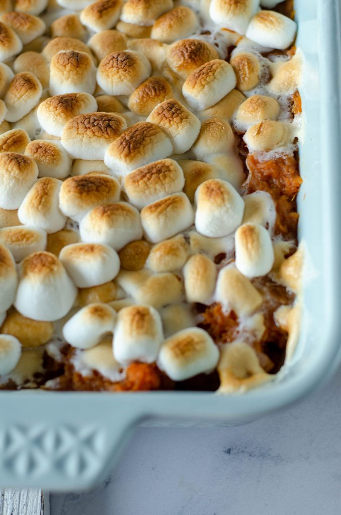 closeup of toasted marshmallows in baking dish