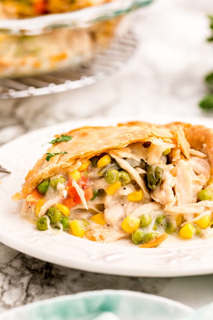 slice of chicken pot pie on a white plate