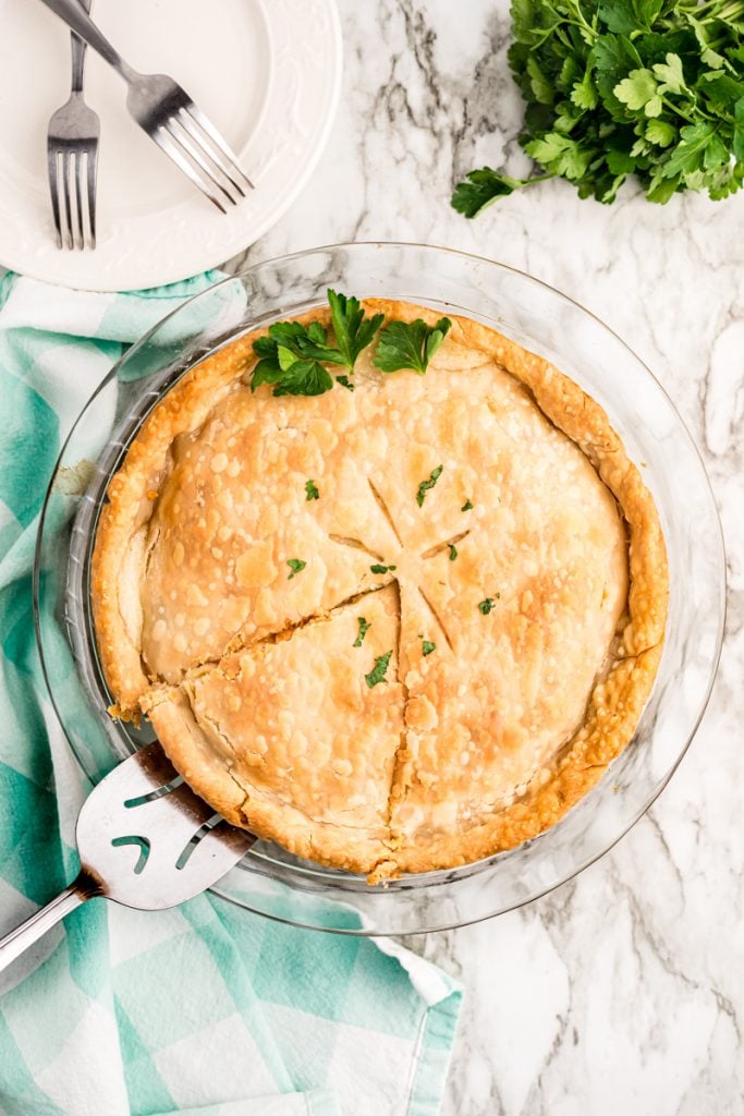 overhead shot of a slice coming out of a pot pie
