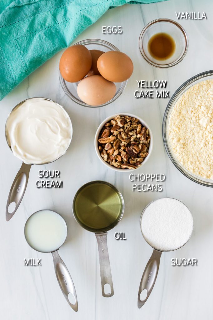 overhead shot of ingredients laid out & labeled to make butter pecan cake