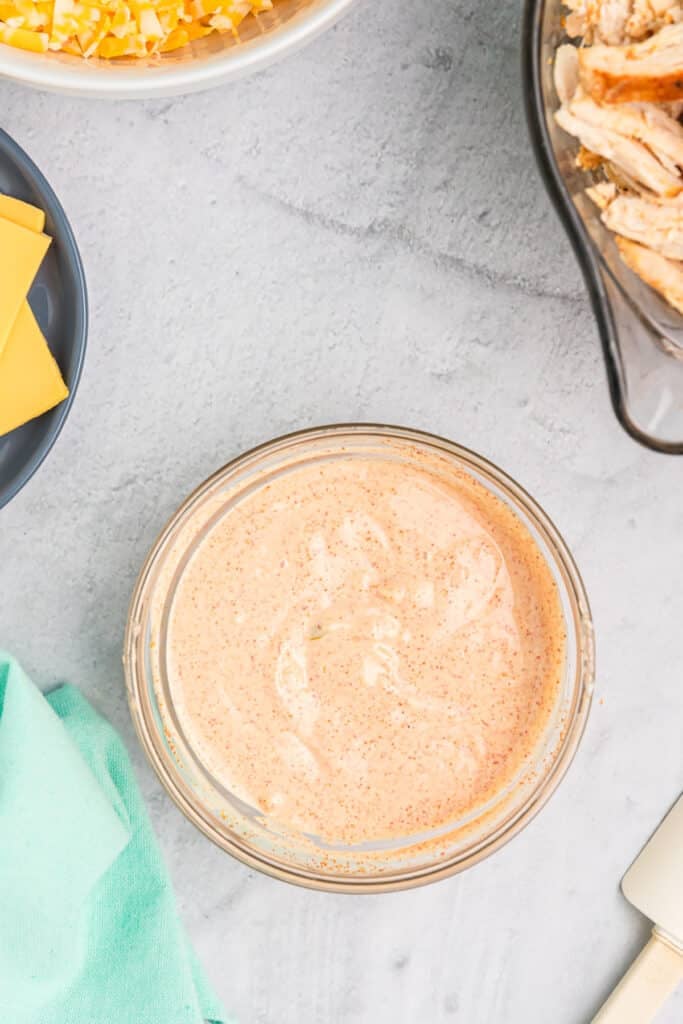 overhead shot of a bowl of copycat taco bell quesadilla sauce.