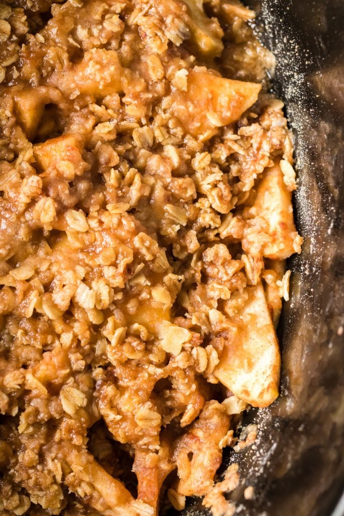 close up shot of apple crisp in a crockpot
