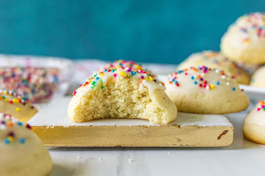 italian sugar cookie with a bite missing.