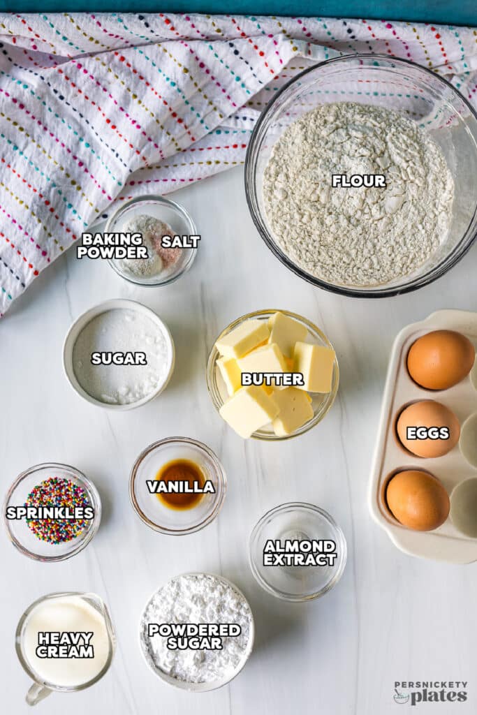 overhead shot of labeled ingredients laid out to make italian sugar cookies.