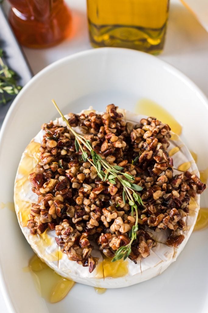 overhead shot of brie prepped to go into the oven
