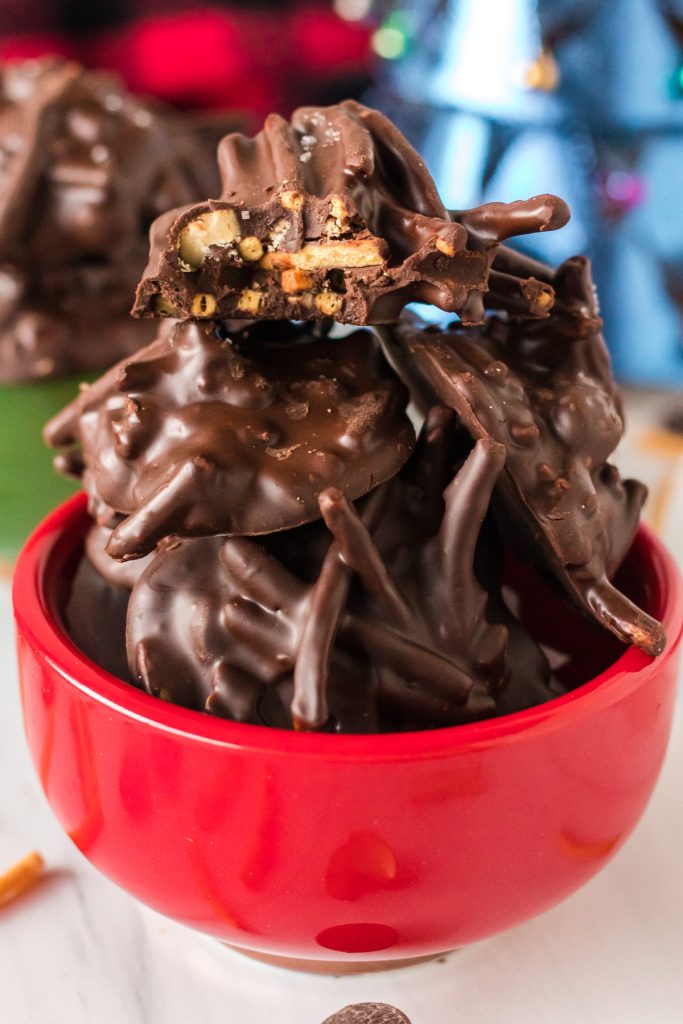 red bowl stacks full of chocolate haystack cookies
