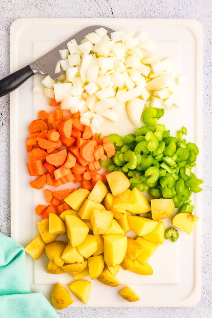 chopped veggies on a cutting board.