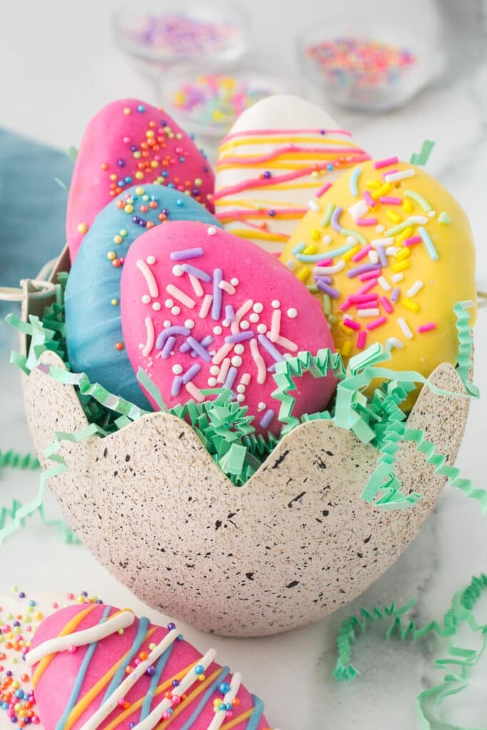 easter egg oreo truffles in a broken eggshell bowl.