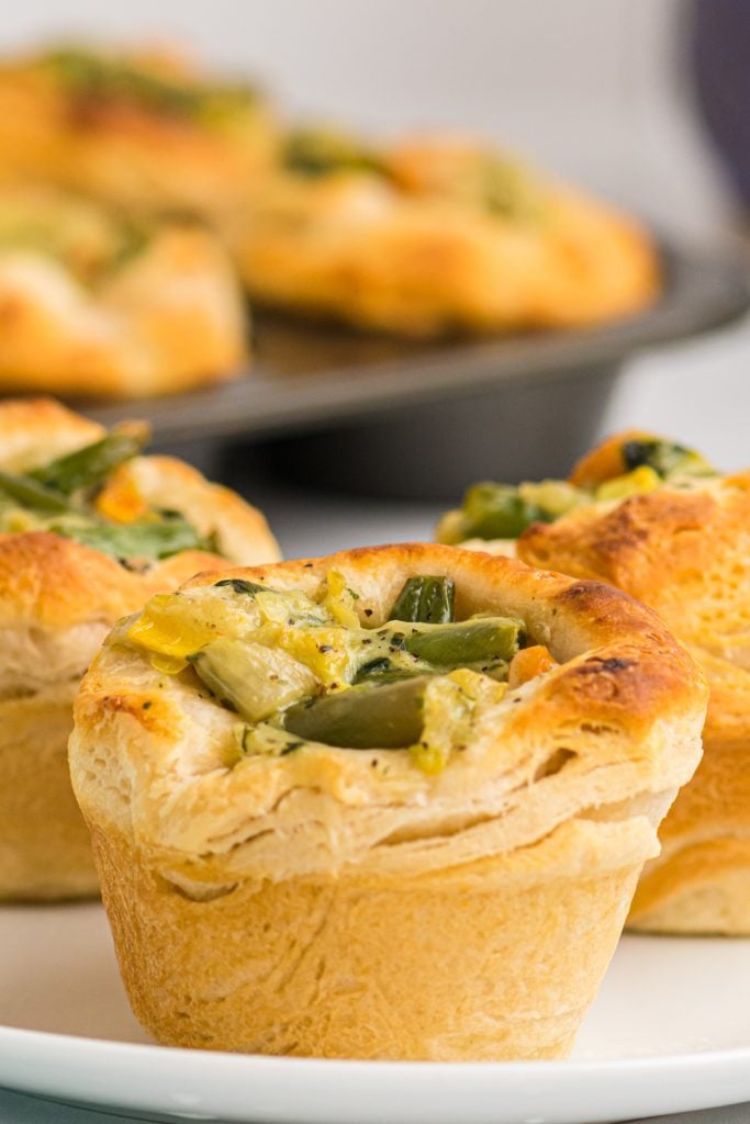 mini pot pie sitting on a white plate.