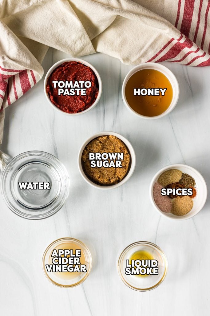 overhead shot of labeled ingredients portioned out to make honey bbq sauce.
