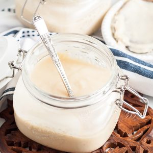 homemade cream of chicken soup in a glass jar with locking lid.