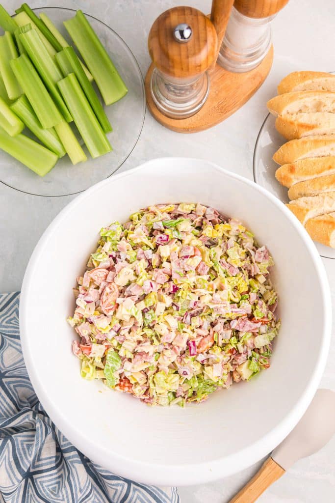 overhead shot of hoagie dip in a white bowl.