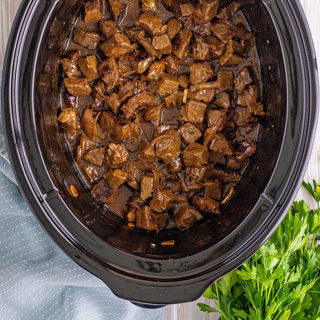 overhead shot of slow cooker steak bites.