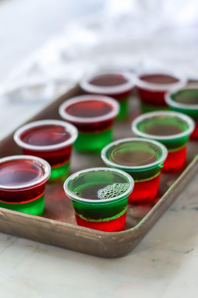 try of red & green layered christmas jello shots.