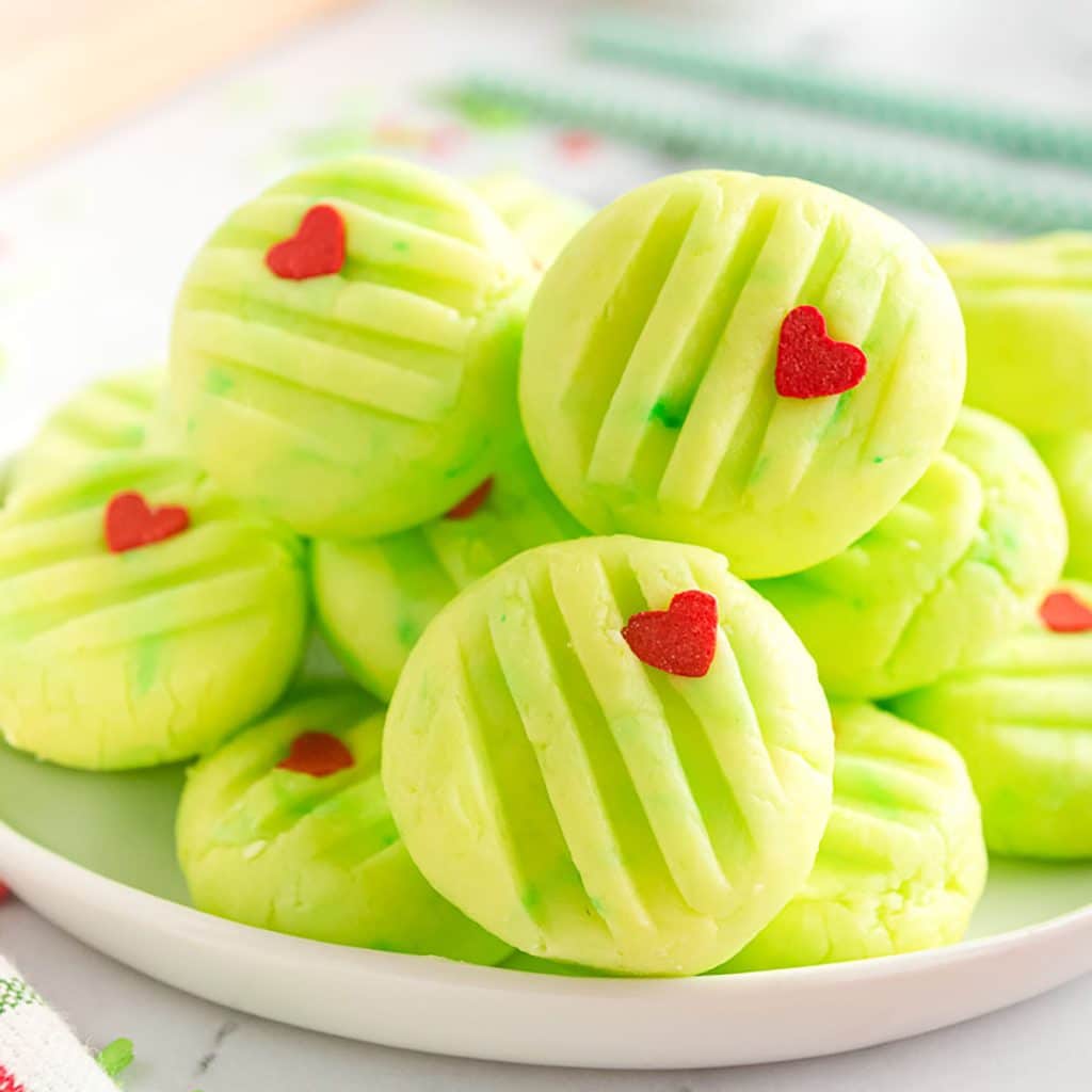 plate of grinch christmas cream cheese mints. 