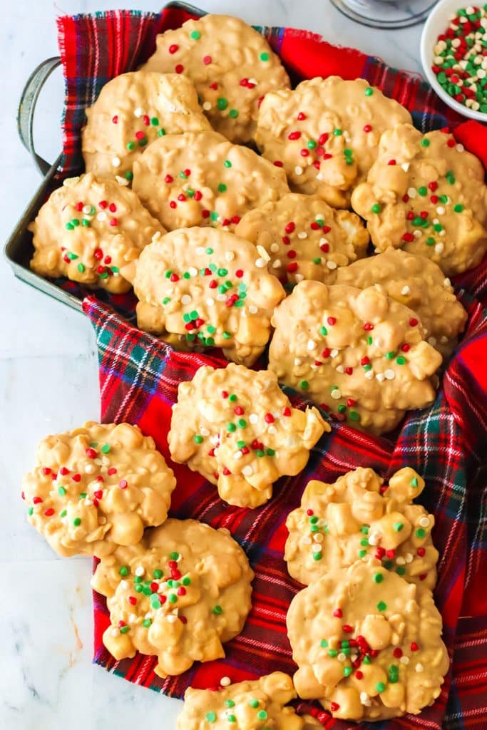 avalanche cookies with christmas sprinkles in a box.