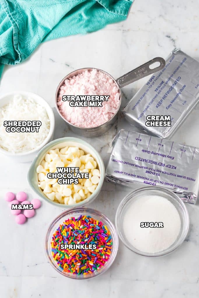 overhead shot of labeled ingredients laid out to make a dessert cheese ball.