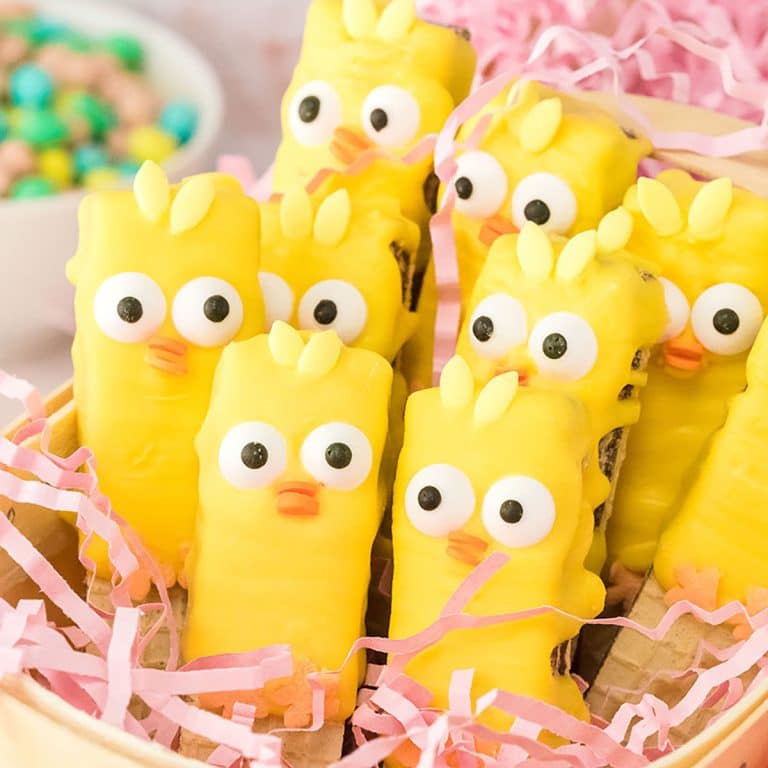 spring chick dipped wafer cookies in a basket.