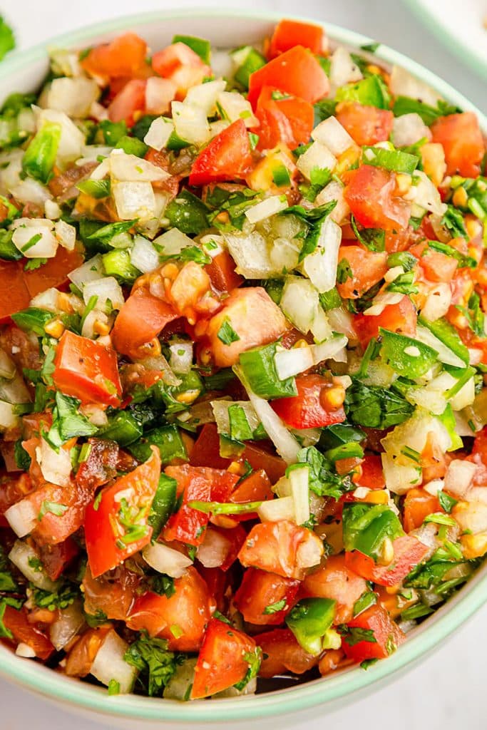 closeup of pico de gallo in a bowl.