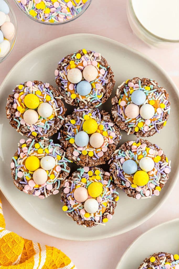 overhead shot of chocolate birds nest cookies on a plate.