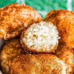 irish potato candy in a bowl with one missing a bite.