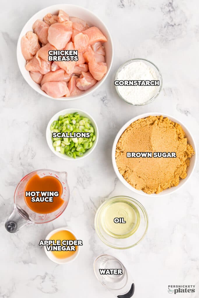 overhead shot of labeled ingredients laid out ot make firecracker chicken.