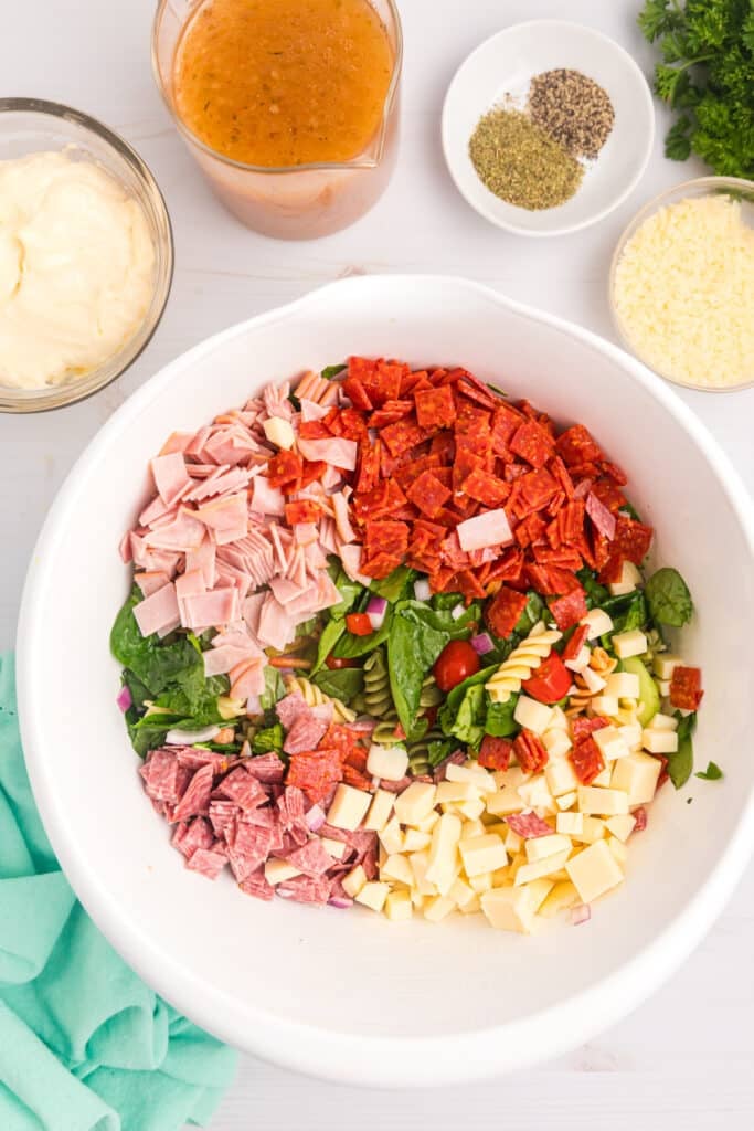 overhead shot of diced salad components in a bowl.