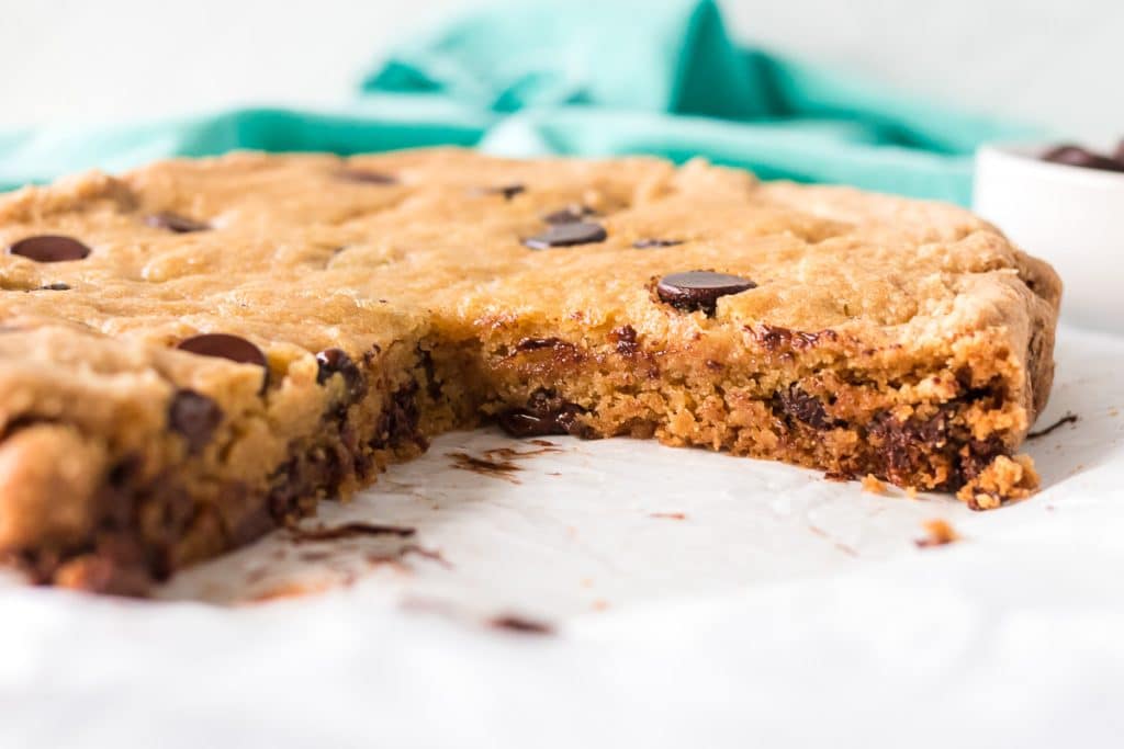 side view of the inside of a chocolate chip cookie made in the slow cooker.