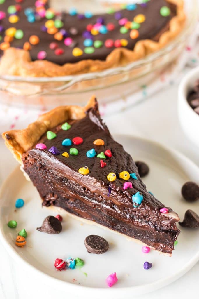 slice of brownie pie with rainbow chips on top.