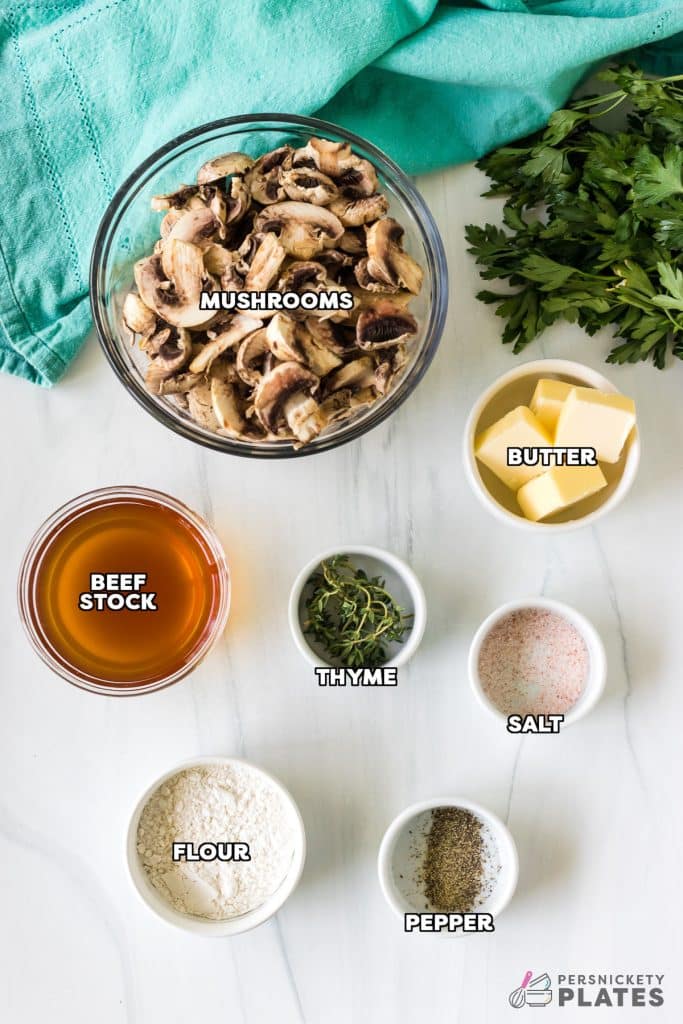 overhead shot of labeled ingredients laid out to make mushroom gravy.