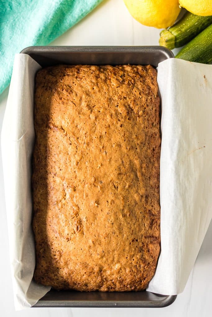 overhead shot of  lemon zucchini bread in a loaf pan.