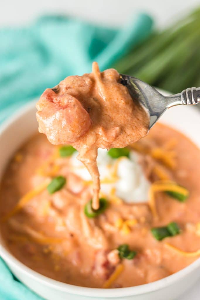 bite of buffalo chicken chili on a spoon.