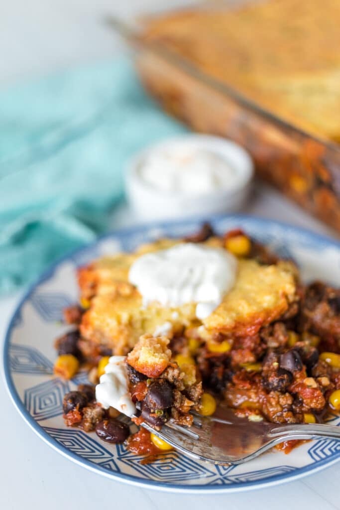 fork with a bite of chili casserole.