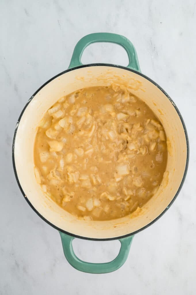 melted butter in a pot with onions.