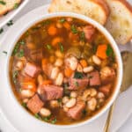 overhead shot of bowl of ham & bean soup.