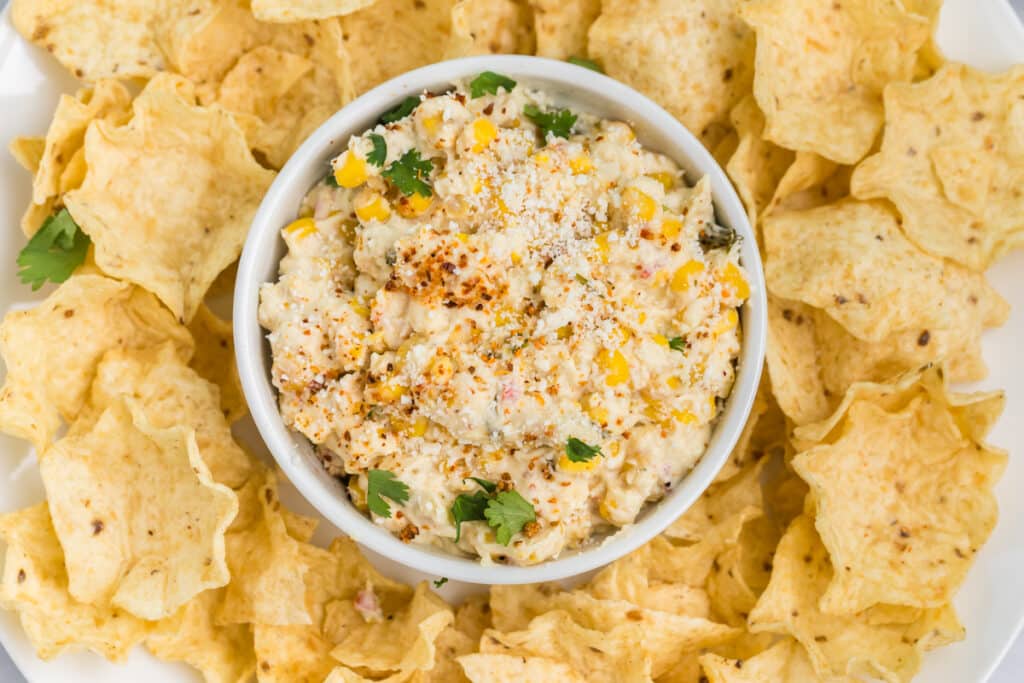 smoked corn dip surrounded by tortilla chips.