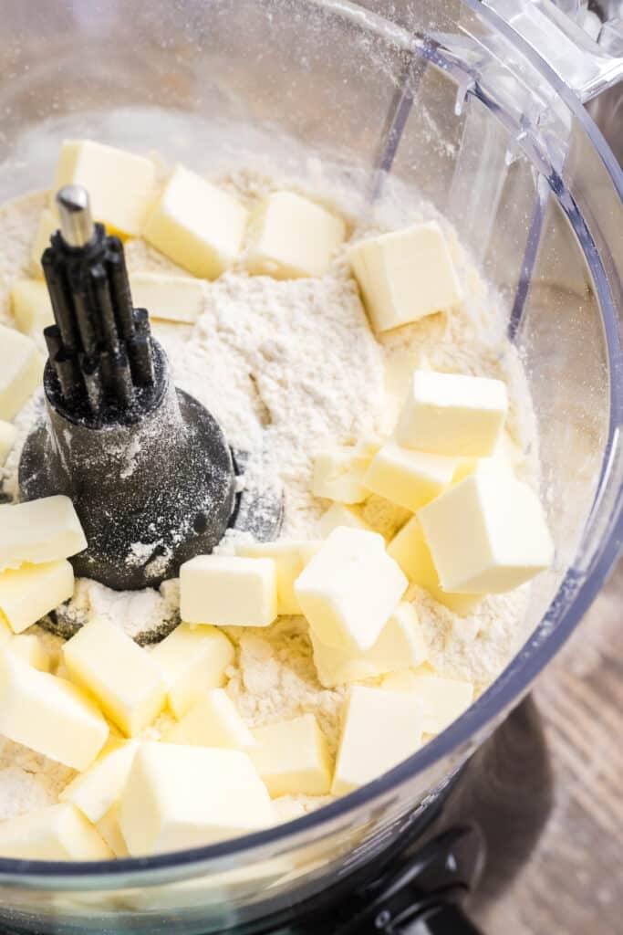 butter cubes and flour in a food processor.