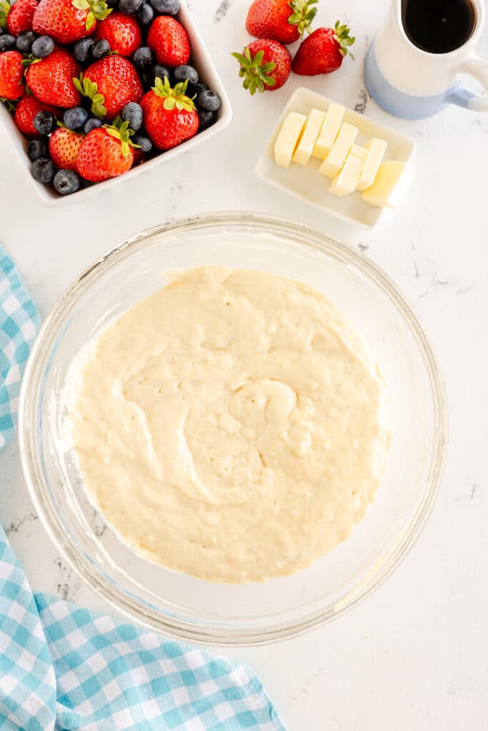 overhead shot of pancake batter in a mixing bowl.