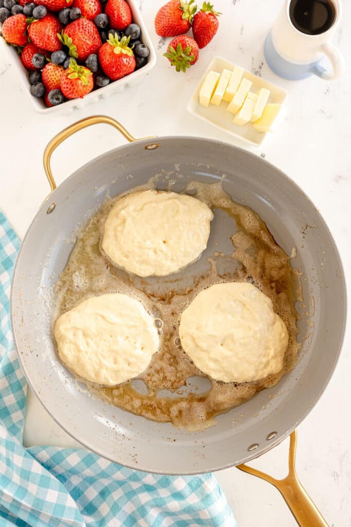 pancake batter in a skillet.