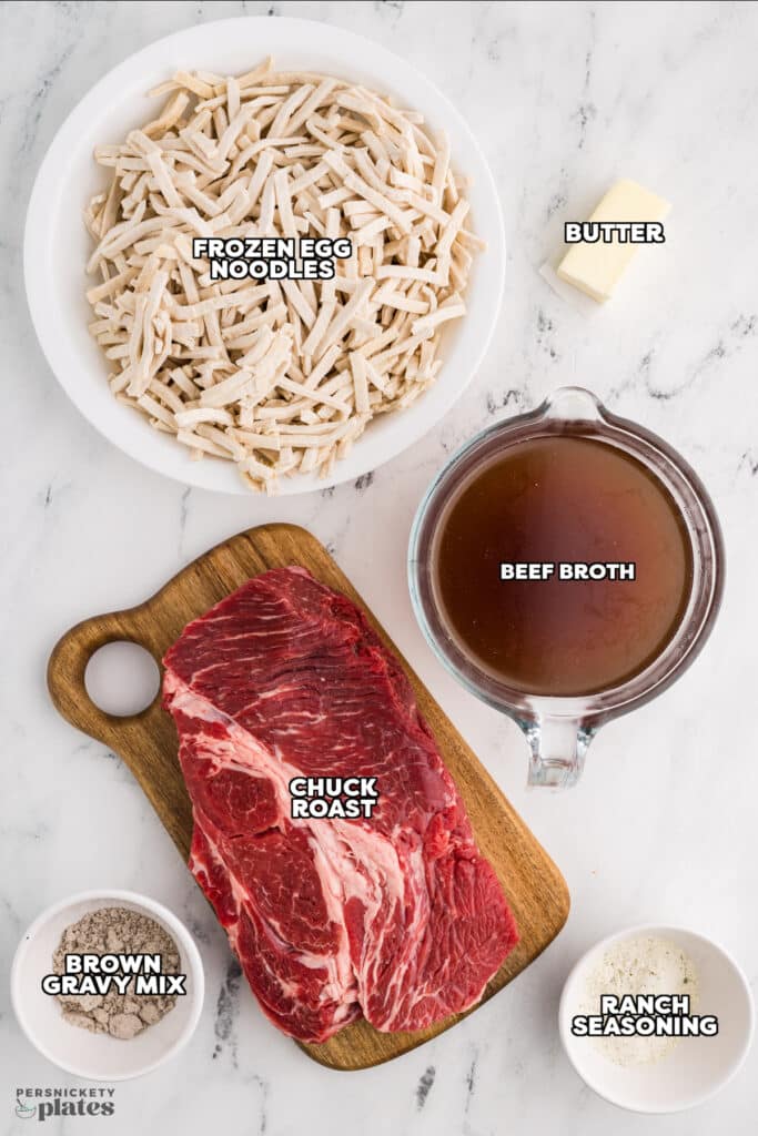 labeled ingredients laid out to make beef & noodles.
