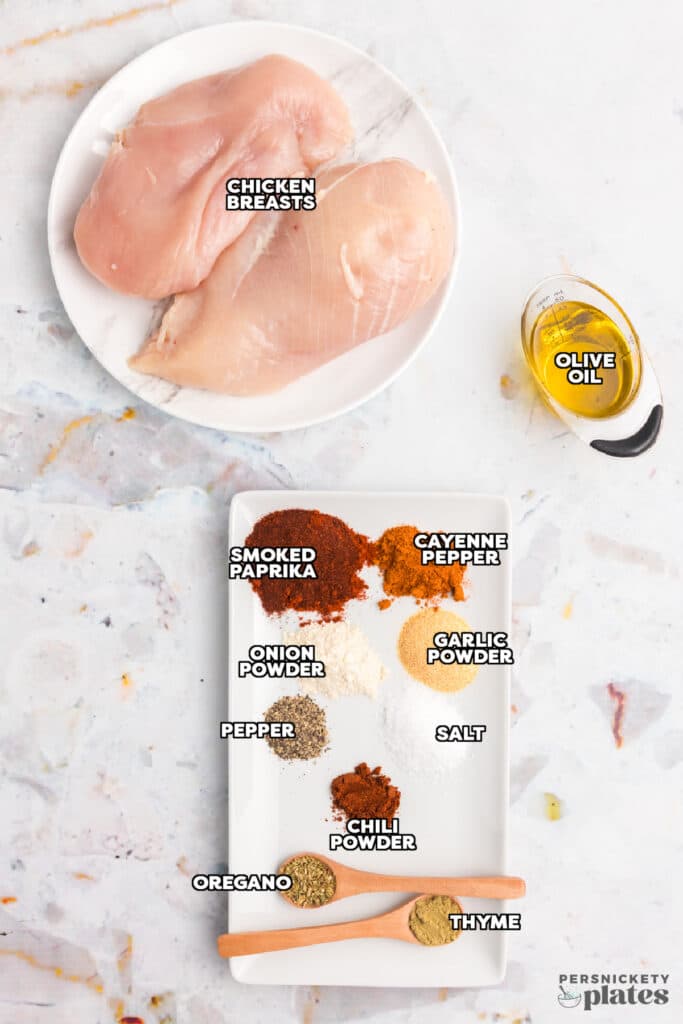 overhead shot of labeled ingredients laid out to make blackened chicken tenders.