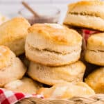 A basket filled with golden, freshly baked biscuits.